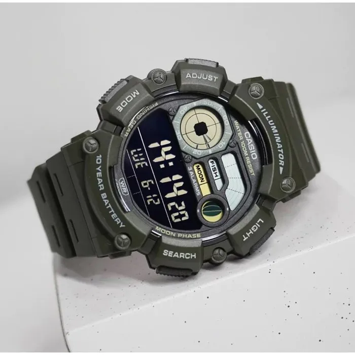 Casio WS-1500H - Montre mixte digitale à quartz - Cadran vert - Chronographe, alarmes, compte à rebours, indicateur lunaire - Étanche 10 bars (10 ans autonomie)