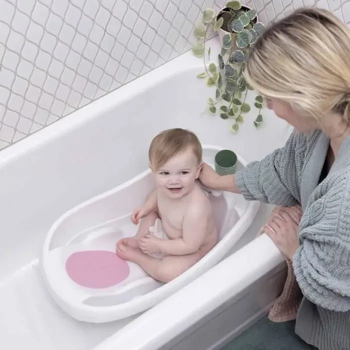 Ingenuity Baignoire bébé évolutive Deluxe rose, de la naissance à 3 ans avec transat/hamac inclus - Comfy Clean Deluxe, porte-bébé en tissu, coussins mousse, plateau aide-parents