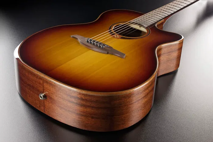 LAG Guitare Acoustique Auditorium A/E Cutaway Édition Limitée Bisel Brown Shadow LAG Guitare Acoustique Auditorium A/E Cutaway Édition Limitée Bisel Brown Shadow
