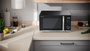 Sharp YC-QG204AE-B Four à micro-ondes digital avec grill 800W 20L, cavité plate sans plateau tournant, argenté