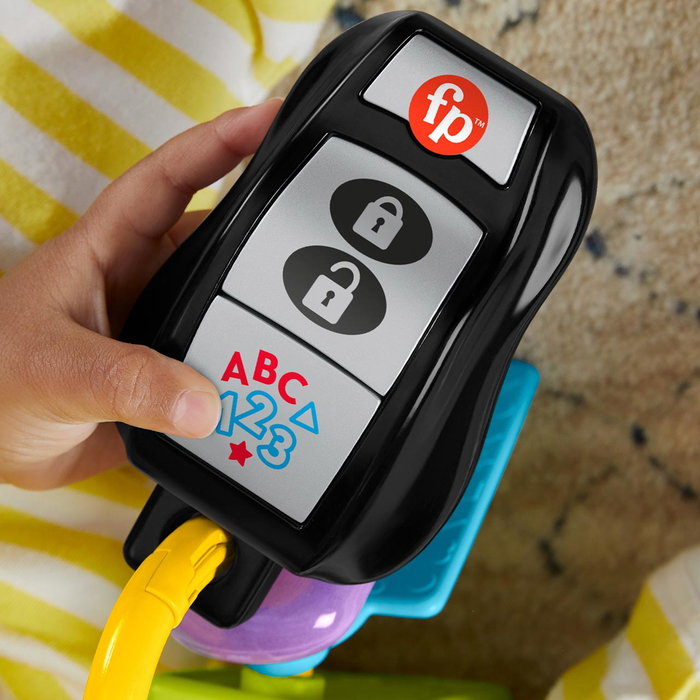 Fisher-Price Llavero Hwy38 - Anneau d'activités pour bébé +6 mois avec 4 jouets, musique, miroir et mordoir, multilingue