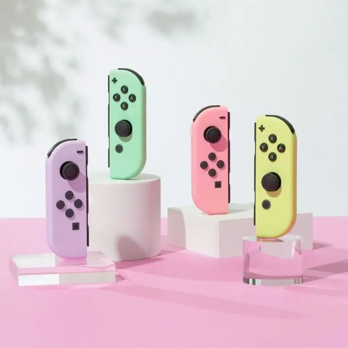 Nintendo Joy-Con (Modèles Rose Pastel et Jaune Pastel) pour Nintendo Switch - Manettes avec Poignée de Partage - Compatibles pour Mode Portable, Multijoueur