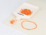 Innspiro Perles de rocaille cylindriques orange aurora boreale 2x2mm 100g