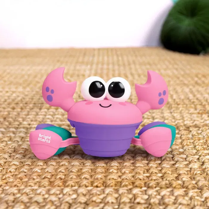 Bright Starts - Jouet d'éveil Rockin' Crawling Crab musical bébé 6M+ rose - Crabe mobile avec musique, détection d'obstacles et arrêt automatique Bright Starts - Jouet d'éveil Rockin' Crawling Crab musical bébé 6M+ rose - Crabe mobile avec musique, détection d'obstacles et arrêt automatique