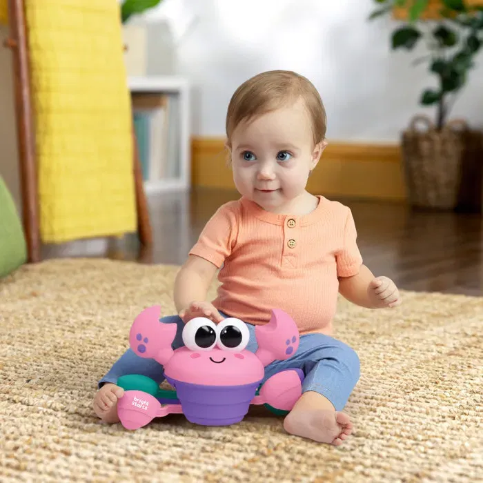 Bright Starts - Jouet d'éveil Rockin' Crawling Crab musical bébé 6M+ rose - Crabe mobile avec musique, détection d'obstacles et arrêt automatique Bright Starts - Jouet d'éveil Rockin' Crawling Crab musical bébé 6M+ rose - Crabe mobile avec musique, détection d'obstacles et arrêt automatique