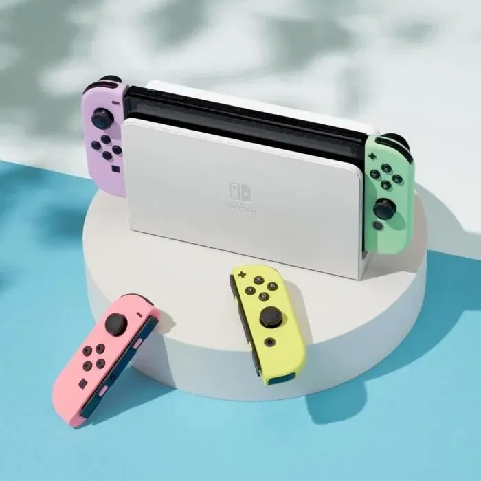 Nintendo Joy-Con Violet Pastel et Vert Pastel pour Nintendo Switch - Manettes sans fil avec fonction HD Rumble et amiibo