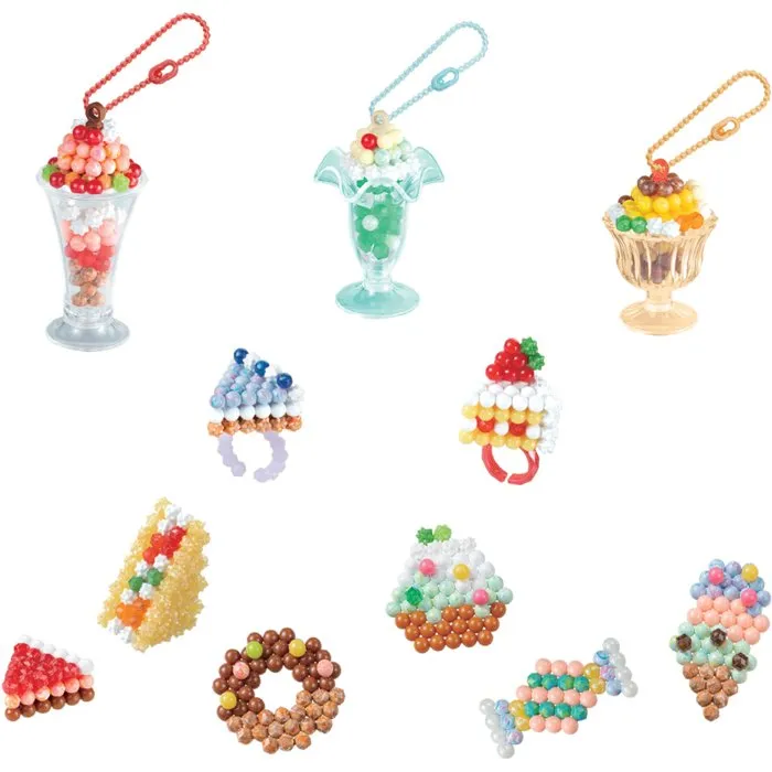 Aquabeads - Mes Accessoires Sucrés - Kit Créatif 35090 - Perles Aqua à Assembler, Bagues, Porte-clés - Sans Chaleur - Jeu pour Enfants dès 4 ans
