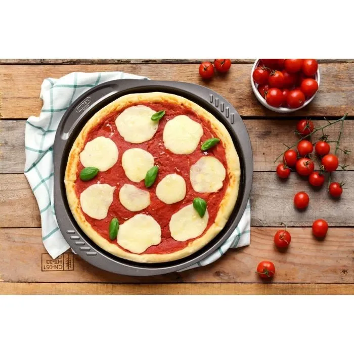 Pyrex 1452055 - Plaque à pizza en métal perforé avec revêtement antiadhésif, poignée ergonomique XL, 32 cm, couleur chocolat