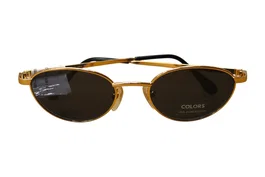 Benetton Lunettes de soleil œil de chat doré unisexe