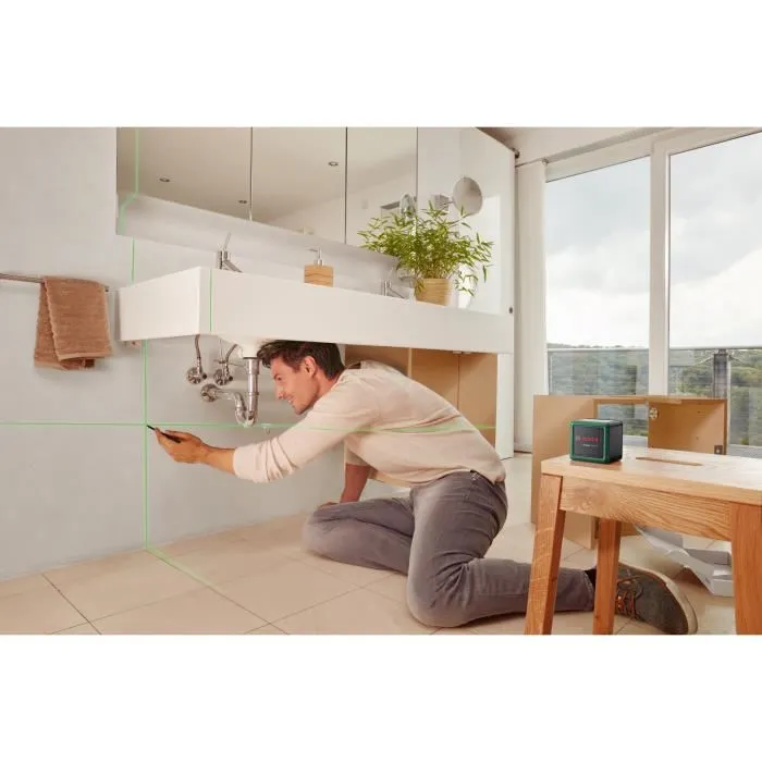 Bosch Quigo Green - Laser de croix autonivelant à faisceau vert - Portée 12 m - Précision +/- 0,6 mm/m - Avec piles, pince MM2 et adaptation