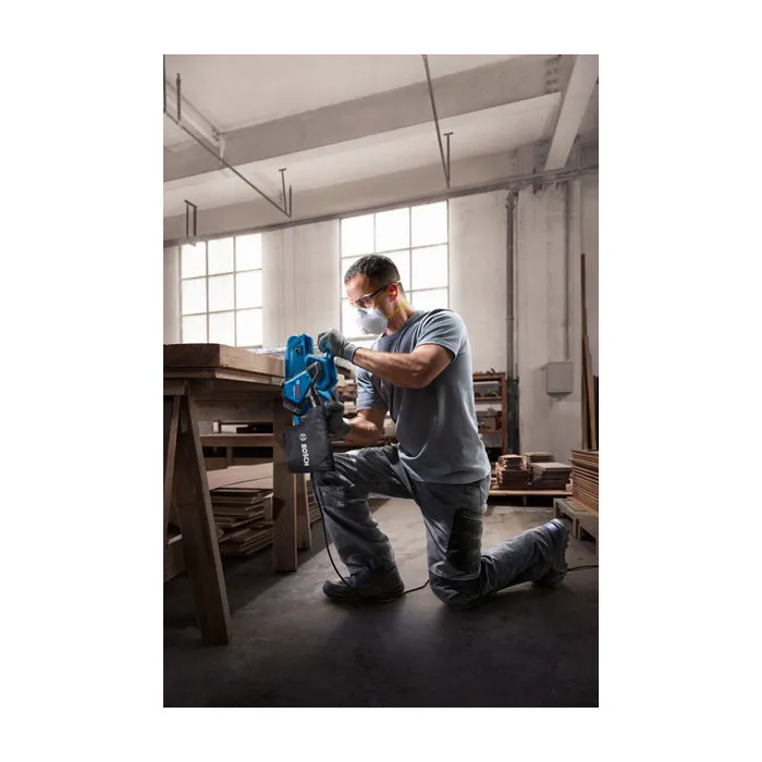 Bosch Professional Ponceuse à bande filaire GBS 750 230V 850W (200-420 m/min) avec bande abrasive et sac à poussière pour bois et métal