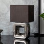 Home Deco Factory Lámpara de mesa acabado cromado en porcelaine
