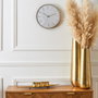 Home Deco Factory Horloge murale silencieuse Luce avec détails dorés