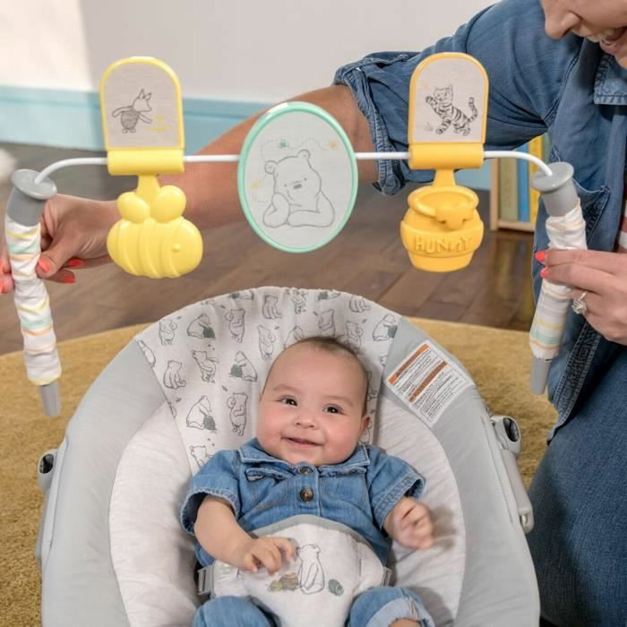 Bright Starts Disney Baby Winnie l'Ourson - Transat bébé évolutif avec arche d'activités Bright Starts Disney Baby Winnie l'Ourson - Transat bébé évolutif avec arche d'activités