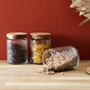 Home Deco Factory Bocal Relieve avec couvercle en acacia 700 ml