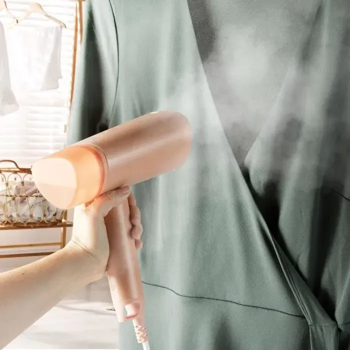 DOMO DO7058S Défroisseur vapeur portable 1300 W 20 g/min, réservoir 100 ml, tête céramique, corail