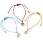 THE CARAT SHOP - Set de 3 bracelets de l'amitié Harry Potter avec Snitch Dorée, Potion d'Amour et Retourneur de Temps en alliage de zinc et nylon