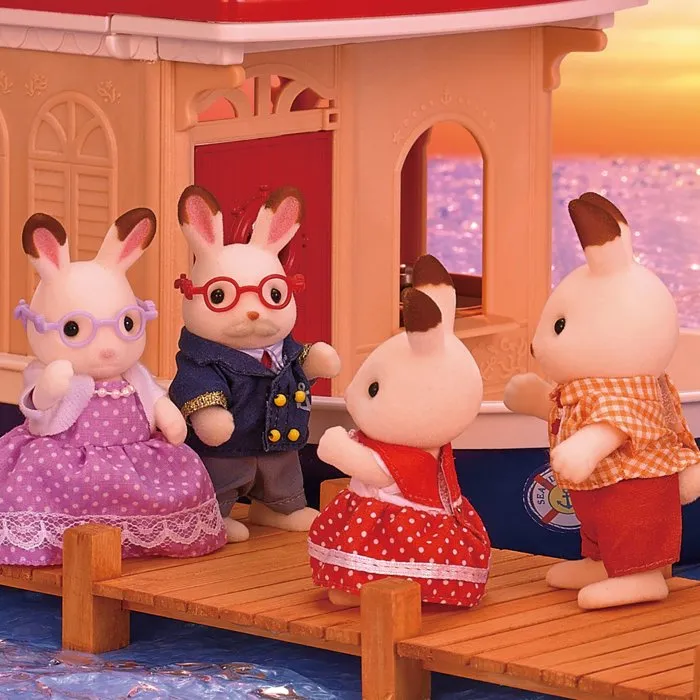Sylvanian Families 5190 Les grands-parents Lapin Chocolat – Rhys et Patricia avec lunettes et tenues marines – Figurines articulées pour collection