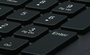 Logitech Clavier USB K280e avec repose-poignet, profil bas et silencieux, résistant aux éclaboussures, noir, disposition Nordic