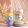 WIDDOP & CO Tasse à thé avec soucoupe Princesse Jasmine Disney - Porcelaine turquoise, motif floral, inscription 'Follow your Heart' - Collection souvenirs