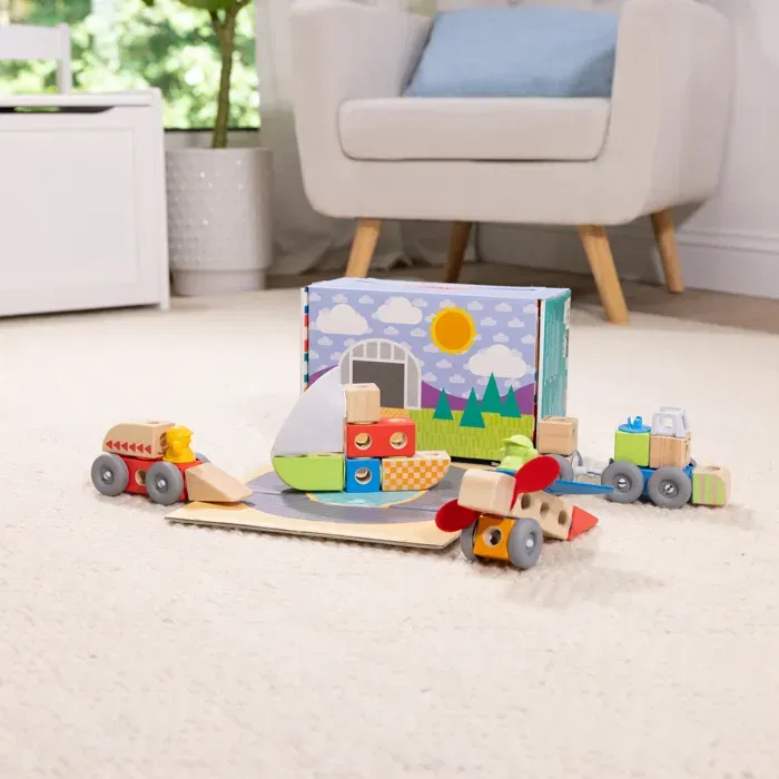Melissa & Doug - Coffret de construction Blockables Les Véhicules - 54 pièces avec blocs en bois, connecteurs, figurines et plateau de jeu - Jeu de motricité pour enfants dès 2 ans