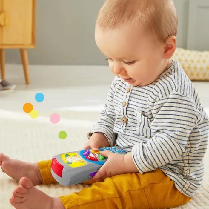 Fisher-Price - La Télécommande de Puppy - Jouet d'éveil musical pour bébés 6 mois et plus - Plus de 35 chansons, sons et phrases - Apprentissage chiffres et lettres - Modèle HXB87
