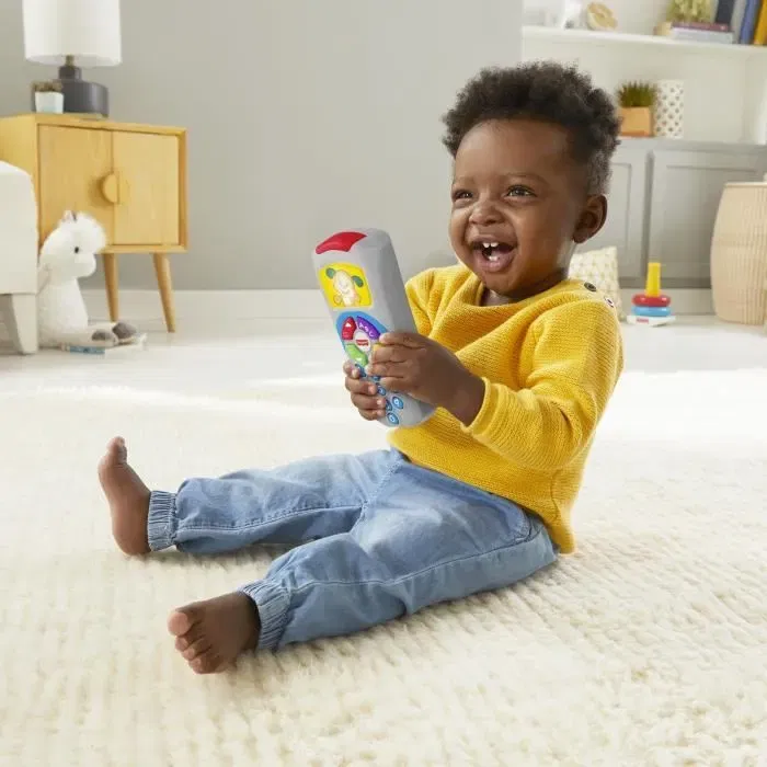 Fisher-Price - La Télécommande de Puppy - Jouet d'éveil musical pour bébés 6 mois et plus - Plus de 35 chansons, sons et phrases - Apprentissage chiffres et lettres - Modèle HXB87
