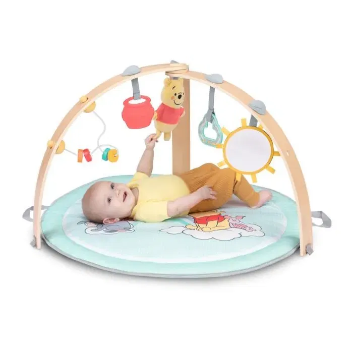 Bright Starts Tapis d'éveil évolutif bébé Disney Baby Winnie, réversible et pliable, avec arche en bois, jouets sensoriels et musicaux, miroir, 5 jouets amovibles