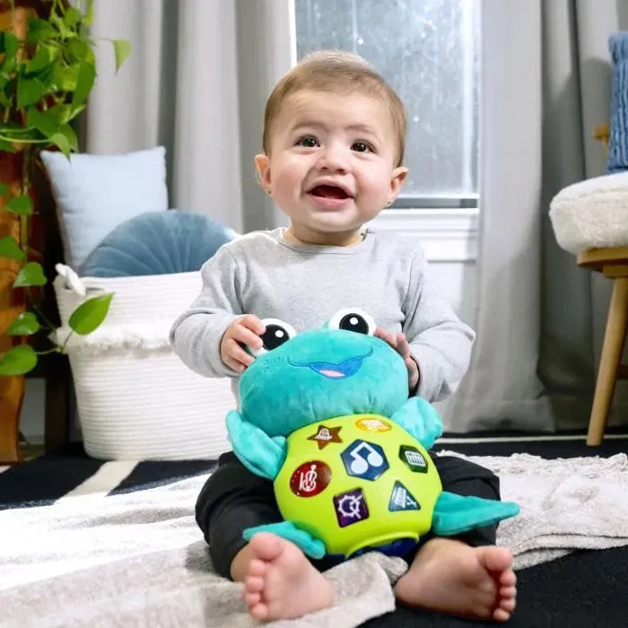 Baby Einstein Neptune - Tortue Peluche Jouet d'Éveil Musical pour Bébé 6 Mois et Plus - 50 Mélodies, 3 Langues, Lumières