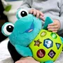 Baby Einstein Neptune - Tortue Peluche Jouet d'Éveil Musical pour Bébé 6 Mois et Plus - 50 Mélodies, 3 Langues, Lumières