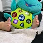 Baby Einstein Neptune - Tortue Peluche Jouet d'Éveil Musical pour Bébé 6 Mois et Plus - 50 Mélodies, 3 Langues, Lumières