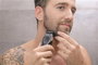 Wahl 09899-016 AQUAGROOM Tondeuse à barbe et corps résistante à l'eau avec/sans fil, rechargeable, avec 12 guides de coupe et batterie lithium pour 3h d'autonomie