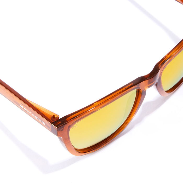 Hawkers Polarisé Caramel Lumière du Jour Lunettes de Soleil Carrées Rose Transparent Unisexe