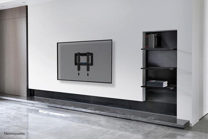 Neomounts WL30-550BL12 Support Mural Fixe pour Téléviseurs/Écrans 24 à 65 pouces (VESA 50x50-200x200mm), Charge Max 40 kg - Noir