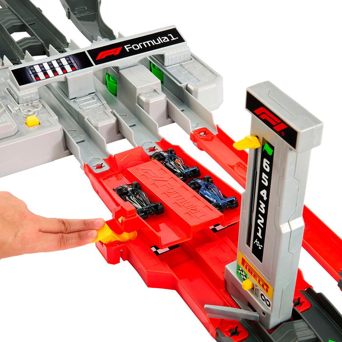 Mattel - Hot Wheels - Circuit de course F1 motorisé avec 3 voitures - Référence JDY16 - Jeu de circuit pour enfants +5 ans avec designs d'équipes Red Bull, Haas, Williams