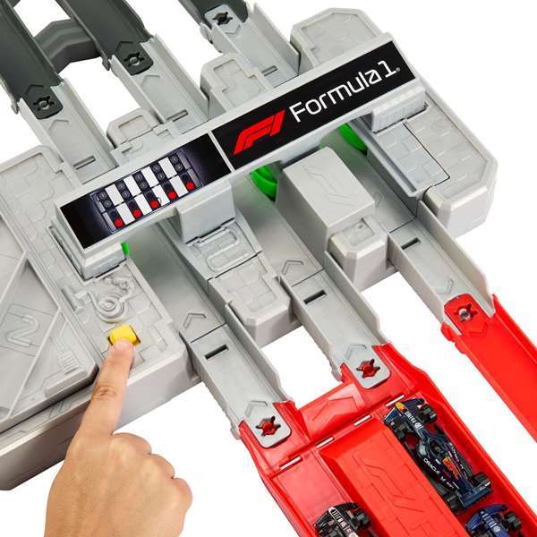 Mattel - Hot Wheels - Circuit de course F1 motorisé avec 3 voitures - Référence JDY16 - Jeu de circuit pour enfants +5 ans avec designs d'équipes Red Bull, Haas, Williams