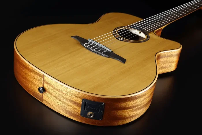 LAG Guitare Acoustique Nylon Auditorium Slim Cutaway Red Cedar - Khaya, Table Cèdre Massif, Électronique Fishman LAG Guitare Acoustique Nylon Auditorium Slim Cutaway Red Cedar - Khaya, Table Cèdre Massif, Électronique Fishman
