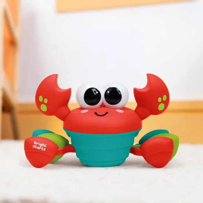 Bright Starts Jouet bébé 6 mois et plus Rockin' Crawling Crab - Crabe musical mobile pour encourager la motricité, avec capteurs d'obstacle et arrêt automatique Bright Starts Jouet bébé 6 mois et plus Rockin' Crawling Crab - Crabe musical mobile pour encourager la motricité, avec capteurs d'obstacle et arrêt automatique