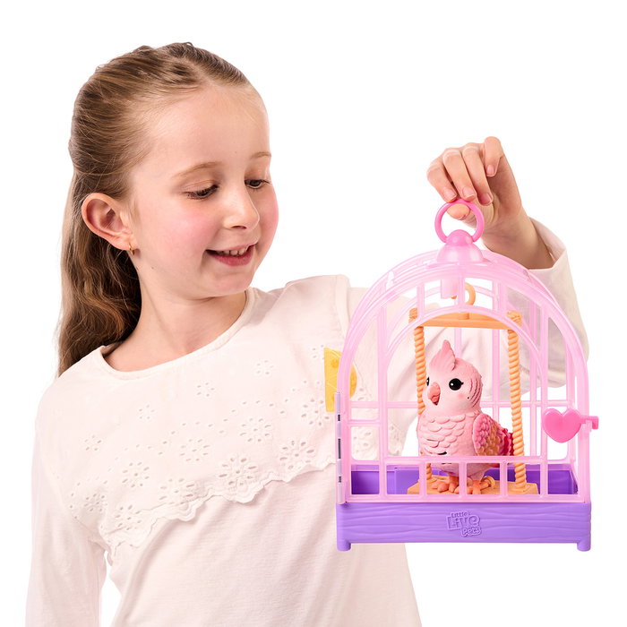 Moose - Little Live Pets Pájaro Parlanchín Rosa 26692 - Oiseau Interactif Parlant Réaliste avec Cage - Plus de 20 Réactions et Sons - Version Espagnole