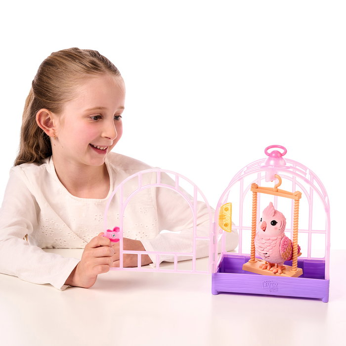 Moose - Little Live Pets Pájaro Parlanchín Rosa 26692 - Oiseau Interactif Parlant Réaliste avec Cage - Plus de 20 Réactions et Sons - Version Espagnole