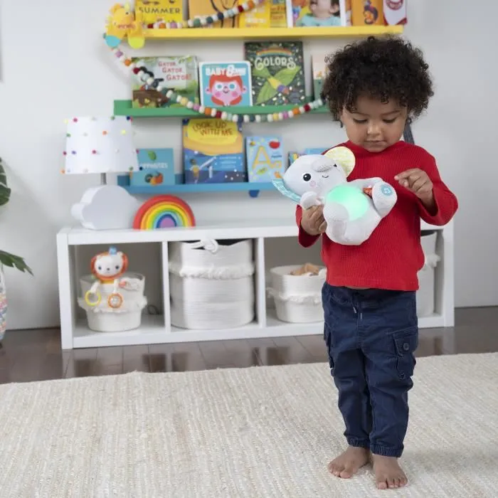 Bright Starts - Peluche doudou veilleuse éléphant Hug-a-Bye Baby avec sons et lumières, jouet d'éveil musical pour bébé