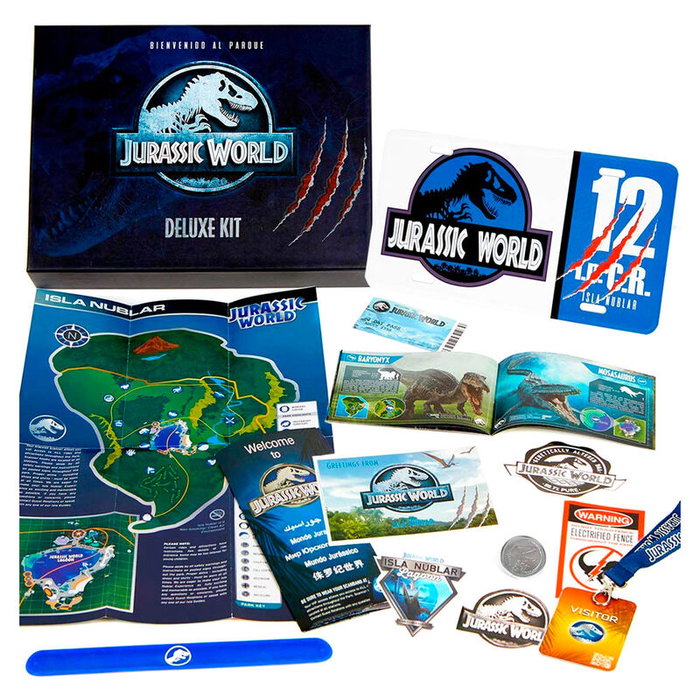 DOCTOR COLLECTOR Kit Deluxe Jurassic World - Matricula aluminium, ticket, pulsera, carte, guide dinosaures, pase VIP, postal, monnaie, stickers