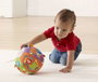 Vtech - Balle musicale pour bébé avec textures variées, 15 mélodies, 5 chansons, 18 cm - Jouet d'éveil espagnol - Fonctionne avec piles AAA (incluses)