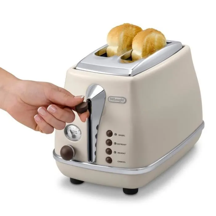 Delonghi Grille-Pain Icona Vintage 2 Tranches 900 W - 6 Positions de Brunissage, Fonction Décongélation et Réchauffe - Beige Brillant / Base et Poignée Chocolat