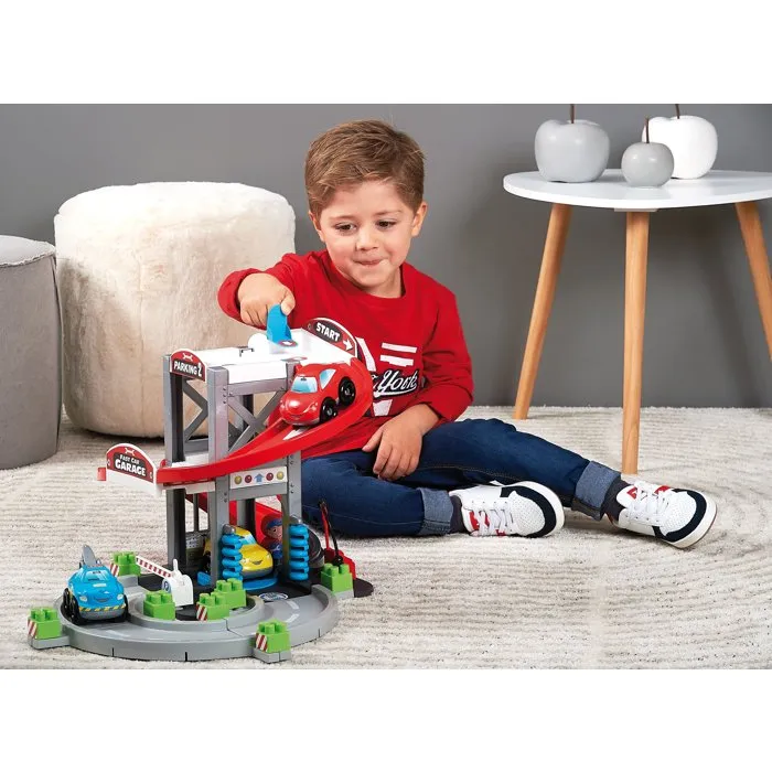 Ecoiffier Garage Abrick - Jouet d'éveil et de construction pour enfant dès 18 mois - Avec 2 voitures, dépanneuse, station essence et lave-auto - Fabriqué en France Ecoiffier Garage Abrick - Jouet d'éveil et de construction pour enfant dès 18 mois - Avec 2 voitures, dépanneuse, station essence et lave-auto - Fabriqué en France