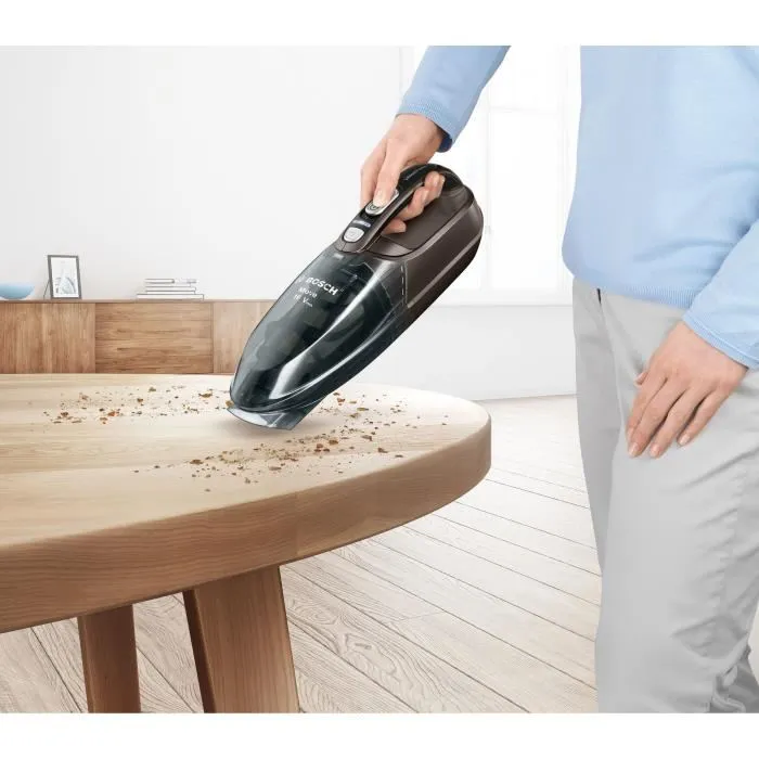 Bosch Move - Aspirateur de table sans sac 16V - Autonomie 40 min avec batterie lithium - Triple filtration cyclonique - Capacité 400ml - Suceur long et plat inclus - Poids 1.1 kg Bosch Move - Aspirateur de table sans sac 16V - Autonomie 40 min avec batterie lithium - Triple filtration cyclonique - Capacité 400ml - Suceur long et plat inclus - Poids 1.1 kg