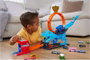 Mattel Hot Wheels - Piste de course City Défi du T-Rex avec lanceur et véhicule - Jeu en espagnol et portugais