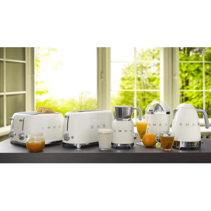 Smeg Toaster TSF03CREU couleur crème, 2 tranches avec fonction décongélation et réchauffage